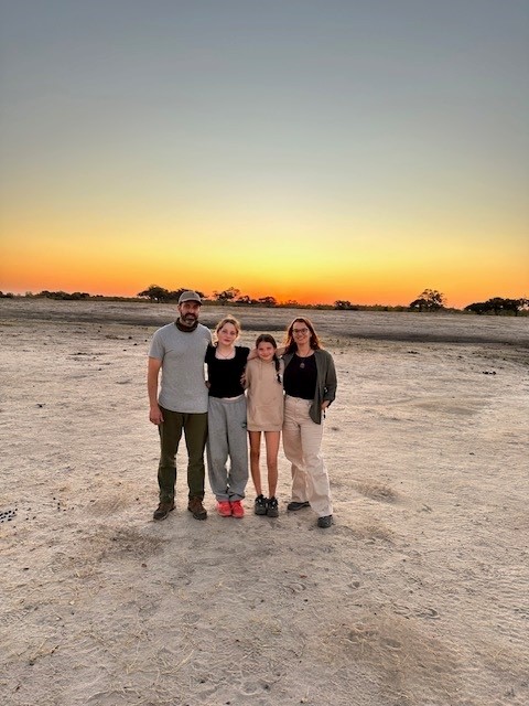 An Artisans of Safari family together at sunset in Africa
