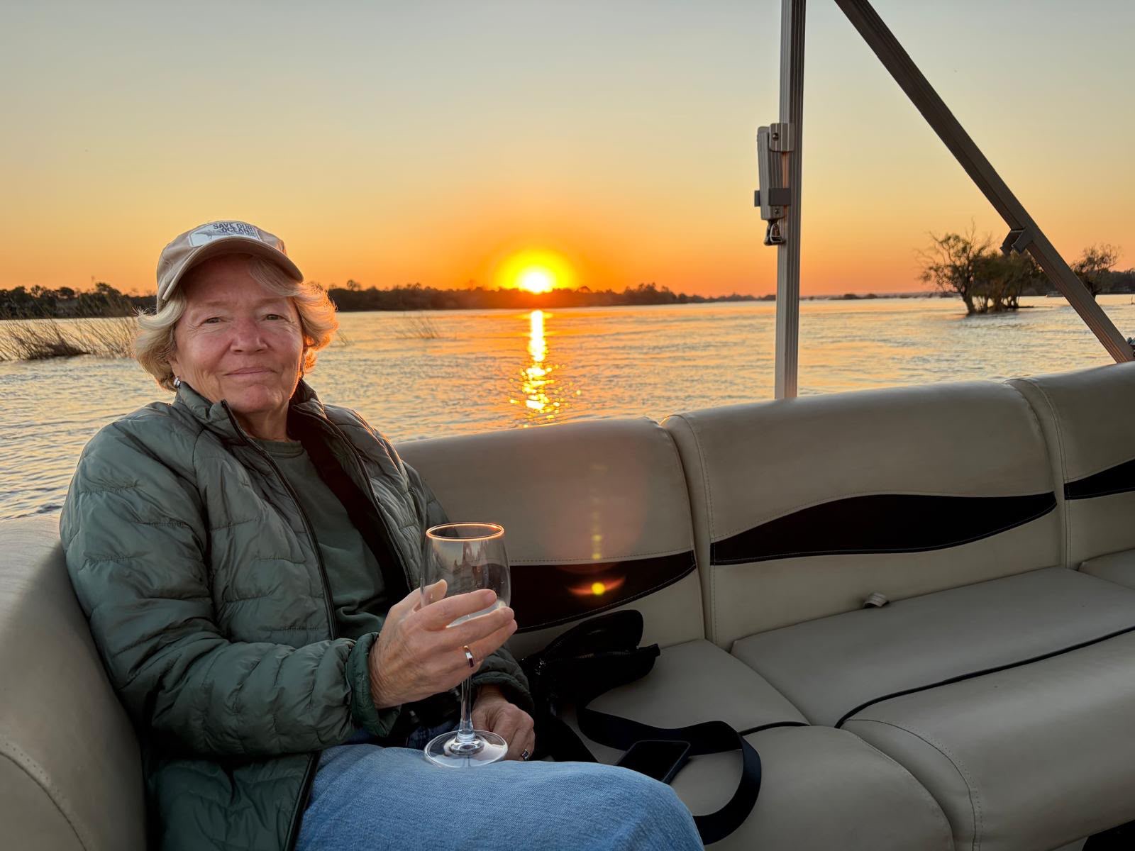 Artisans of Safari traveler enjoying a sunset on the water